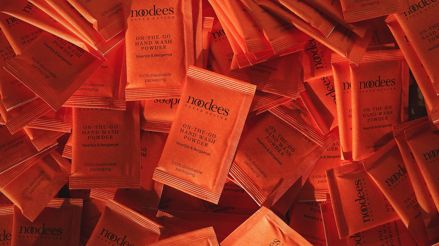 Individual red packets of handwash powder