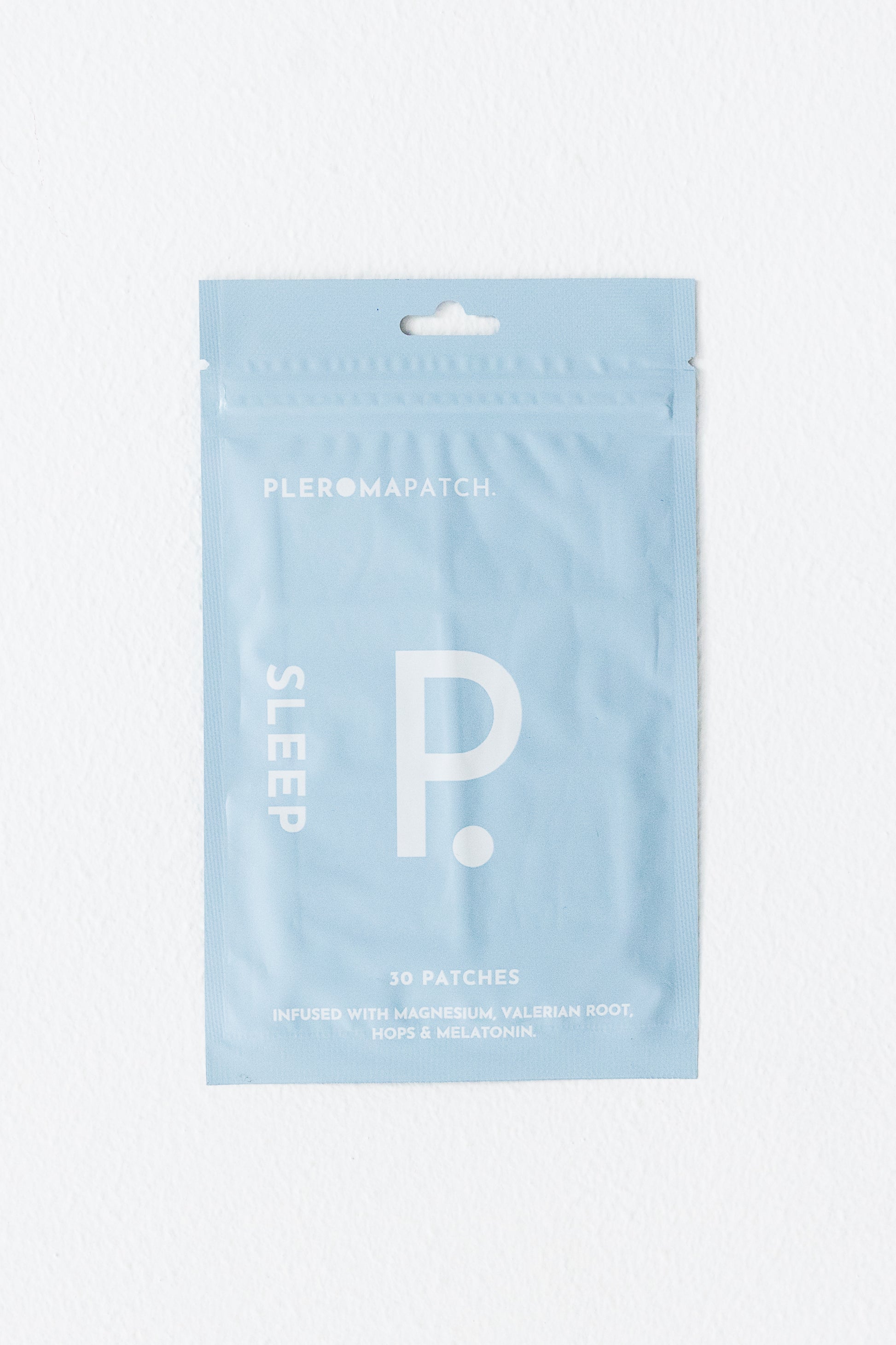 A packaged sleep aid patch with the brand logo visible on the front, labeled 'P'
