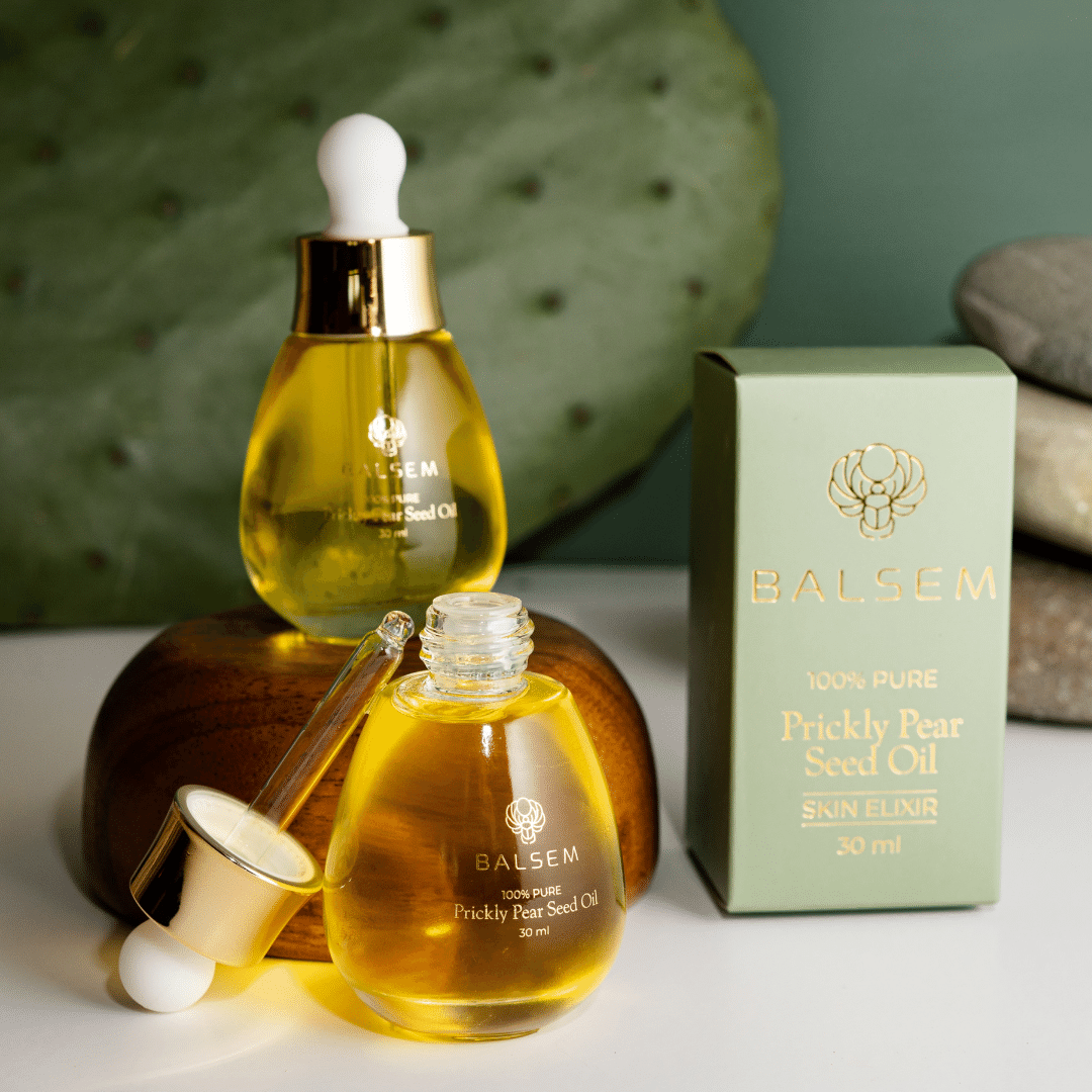 Dropper bottle of prickly pear oil with minimalist label